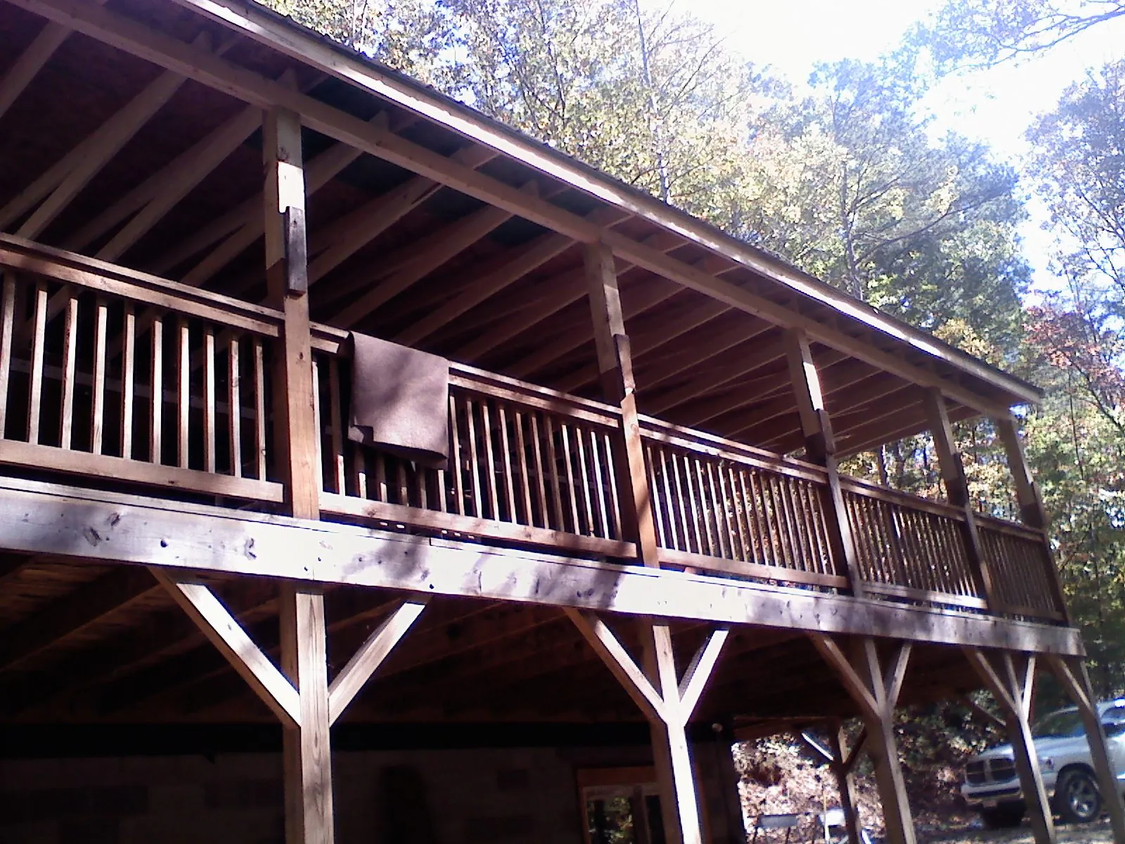 Timber framing under a new elevated porch and deck — Roof Leak Repair in Orcas by Roofing Brothers